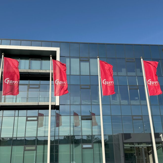 Modern building with red flags