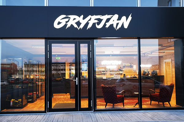Storefront with sign 'GRYFJAN'