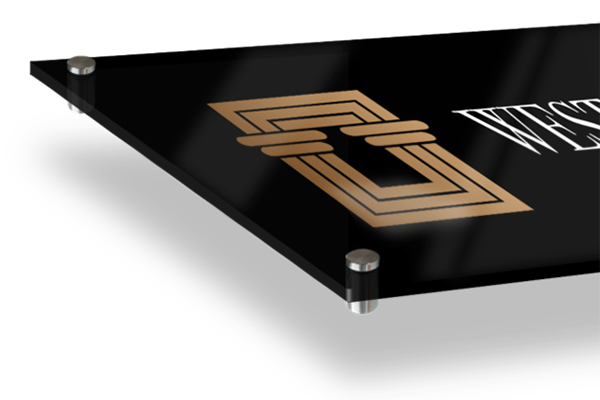 Black sign with gold geometric design